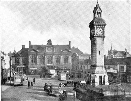 the clock tower in the Market Place - town hall behind