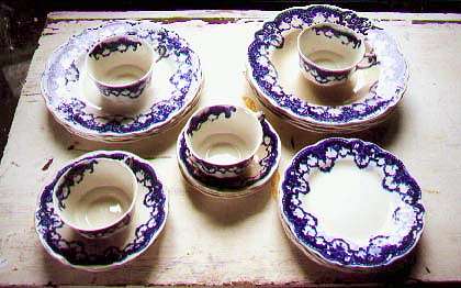 Flow blue set for 4 signed Dudson Wilcox & Till Ltd, Hanley England