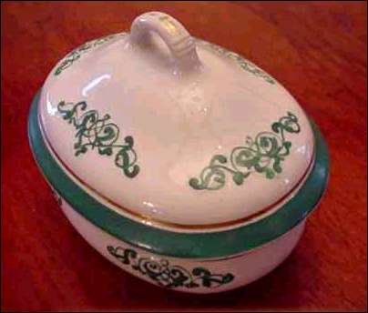 White ironstone dish with lid - decorated with green & gold