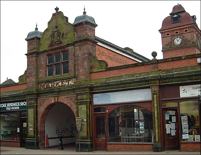 This single storey market building contained several small shops either side of the main entrance