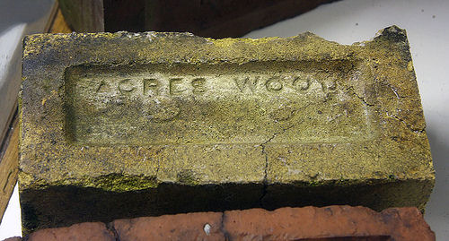 Brick marked Acres Wood
