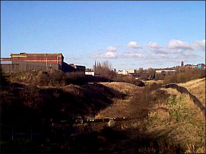The bakery on the left and the town of Burslem in the right background