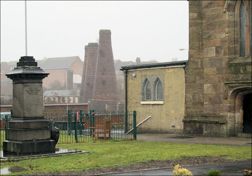 The view towards Burslem shows the remaining bottle kilns in the grounds of Acme Marls