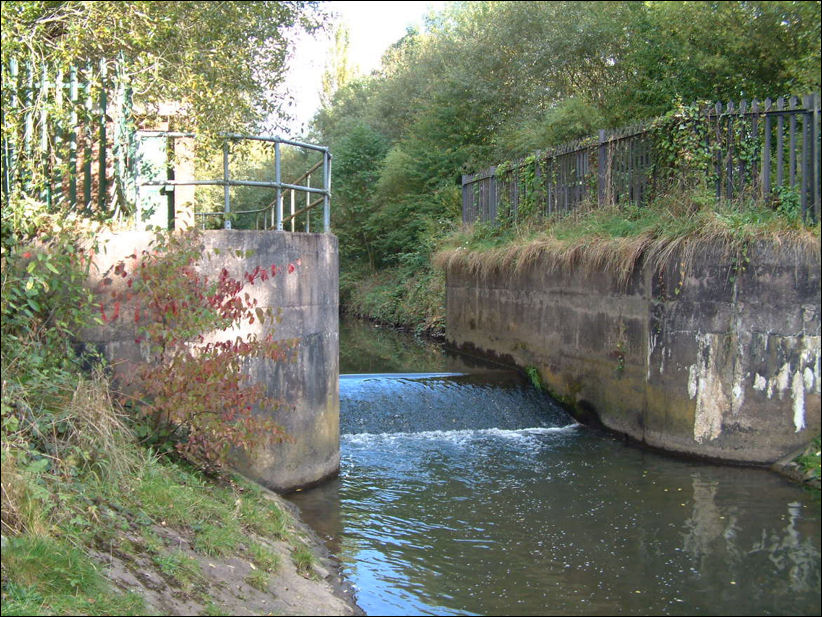 The weir of Upper Botteslow Mill  on the River Trent at the bottom of Trentmill Road 