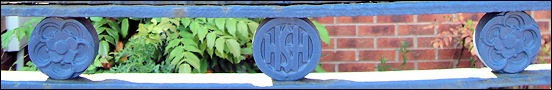 A smaller version of the HSH roundel appears above the panels,