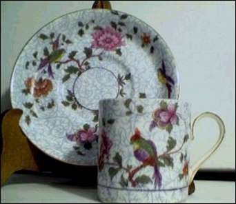 DEMITASSE CHINTZ CUP AND SAUCER SET IS MADE BY CROWN STAFFORDSHIRE, ENGLAND.