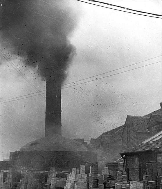 smoke from a brickworks beehive Kiln