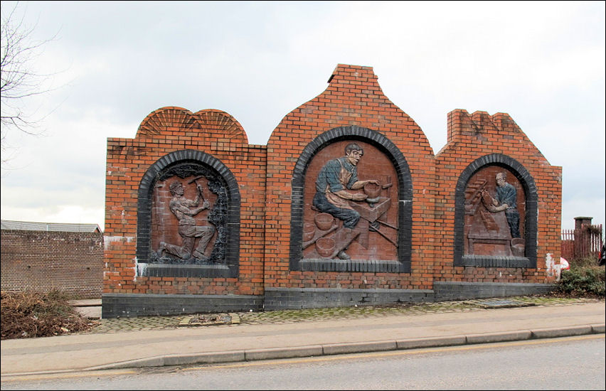 These panels celebrate three traditional industries of Burslem, brick manufacture, mining and pottery.