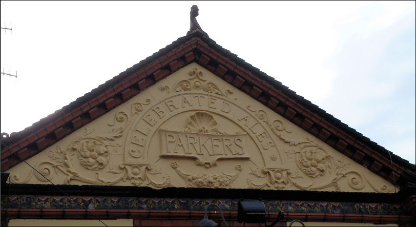 the pediment over the entrance to the Highland Laddie