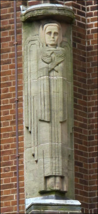 carved from sandstone in the Art Deco style 