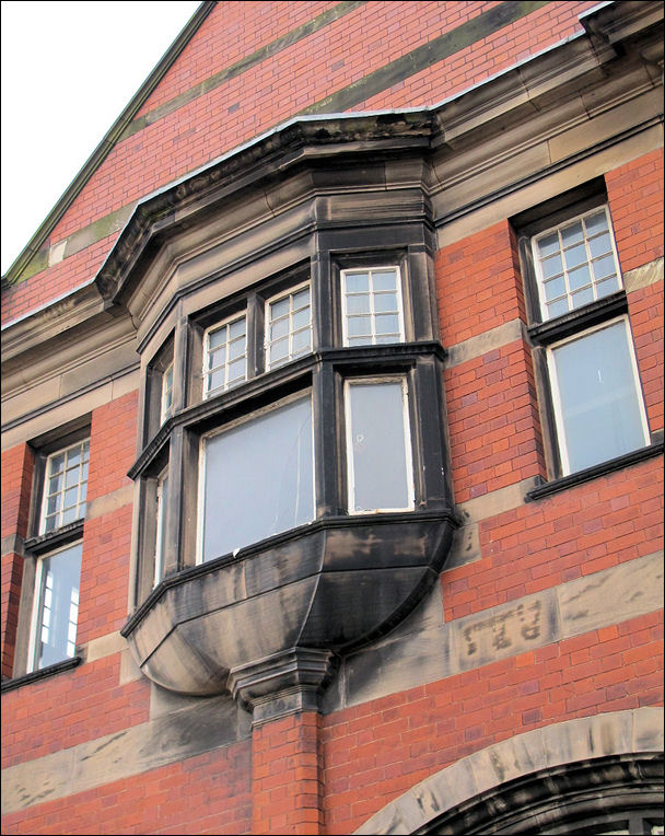 detail of the oriel window on the first floor