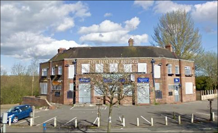 The Holden Bridge - boarded up after it closed in 2007