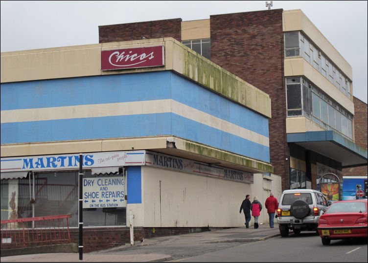 Martins drapers and clothes shop and above is the old Chicos disco