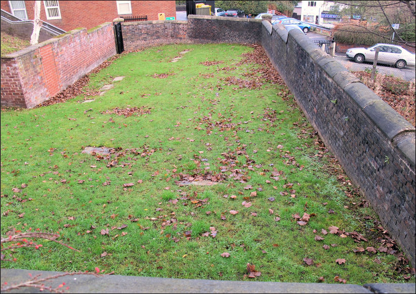  from the grounds of the NHS Health Care Centre on Pump Street is this  view of the Quakers burial ground 