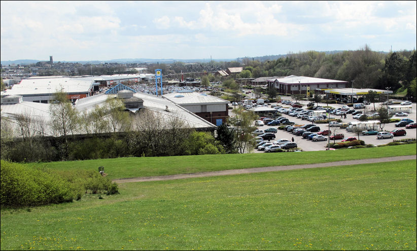view over the retail park - in the left distance is St. Marks Church - to the right is the woodland ridge 