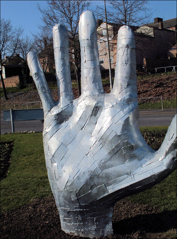 We have given the sculpture a nickname of 'The hand of recycling.'