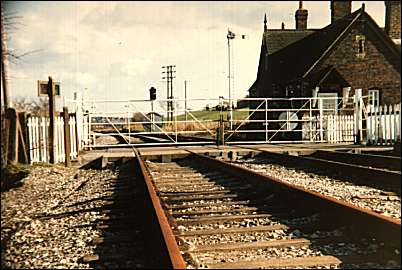 the same railway crossing and crossing mans' cottage in 1986