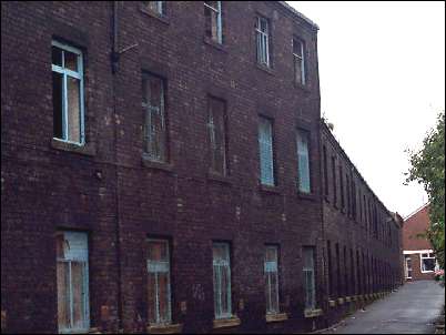 Stubbs Lane - a small back alley running behind the large 'Hanley Pottery' works of Johnson Brothers
