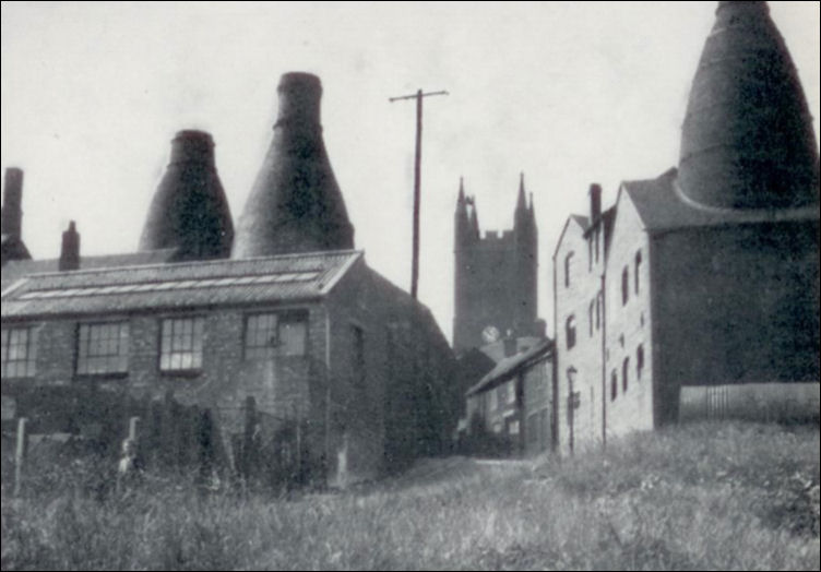 looking up Barlow Street towards St. James Church, on the left the Blue Bell Works, on the right the Duchess Works