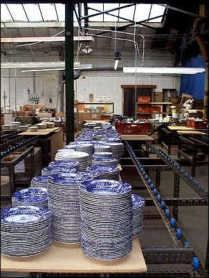 next door to the Curvex printing shop is the packing area where the finished ware is packed for export