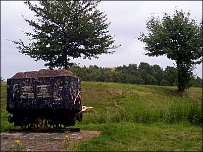 mine tub and commemorative plaque