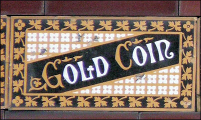 Gold Coin tiles on houses at Sherburne Road, Stoke