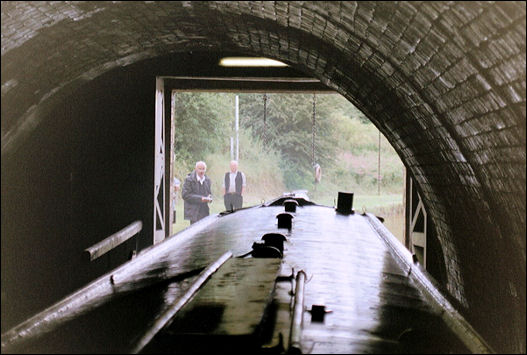 Narrowboat leaving the south entrance of Tomas Telford's tunnel 