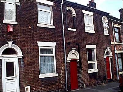 red brick - good quality but modest terraced houses