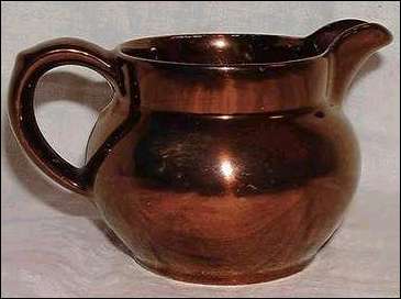 English copper luster pitcher. 
