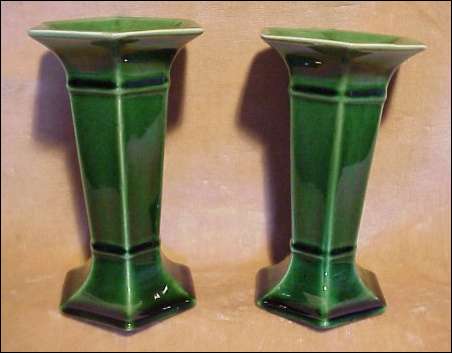 A pair of Wardle Art Pottery candle holders in rich green gloss glaze. 