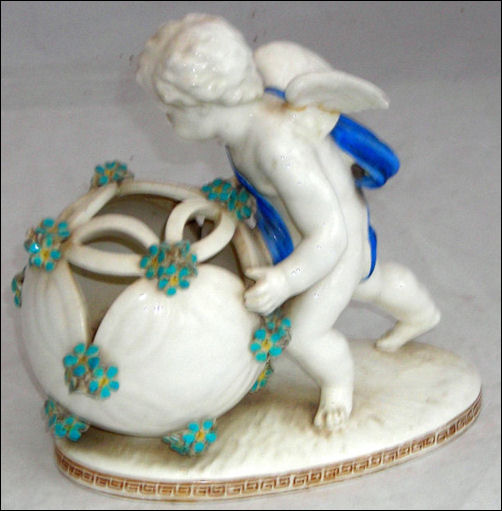 Moore Bros flower vase with cherub