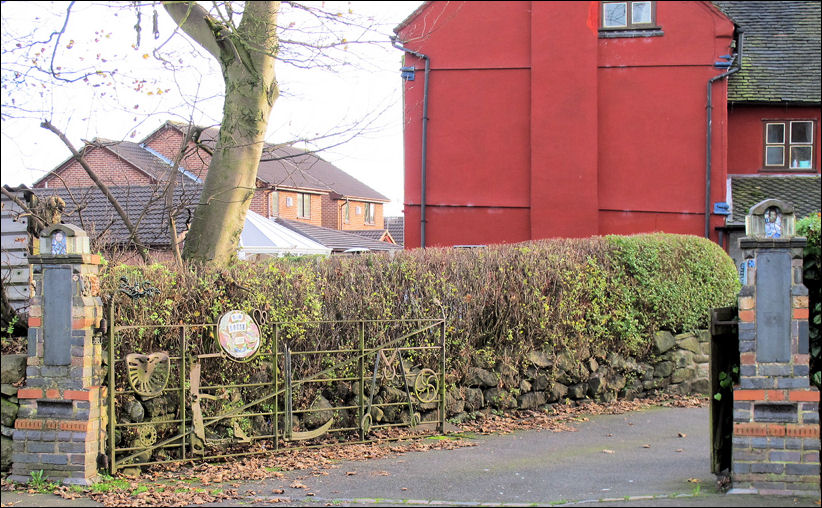 the detail in the gate and gate posts to Elm House show Philip Hardaker's work 