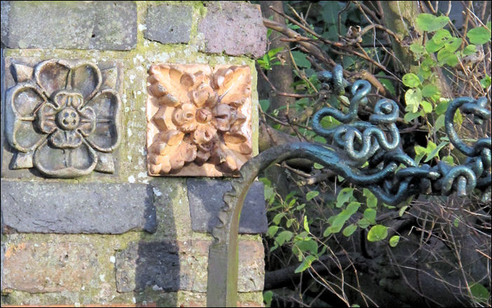 detail of the posts and the corner of the gate 