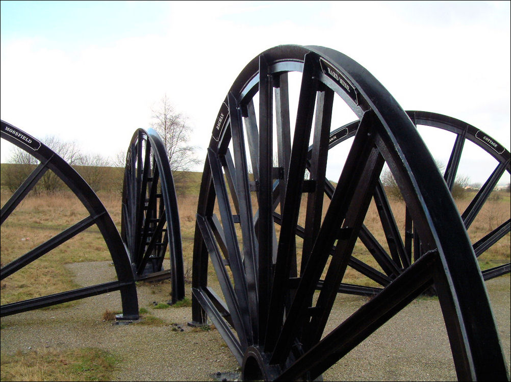 The wheels have nameplates which depict the local seams mined and some of the collieries in the area