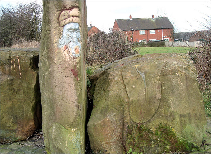 the third is carved with a Daliesque melting watch, with a snail on the other side