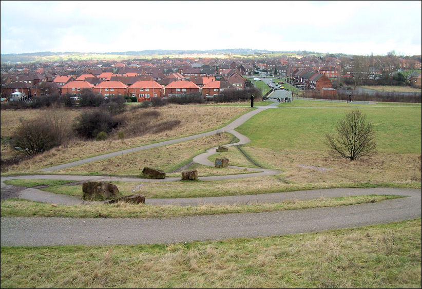 the view back down the path, in the far distance is Bagnall and Light Oaks  