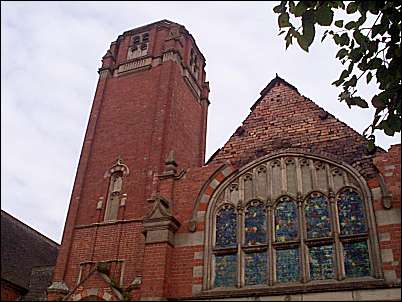 Tower above the entrance with the right hand chapel window