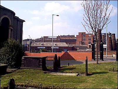 Woodbank Road runs just the other side of the red-brick wall