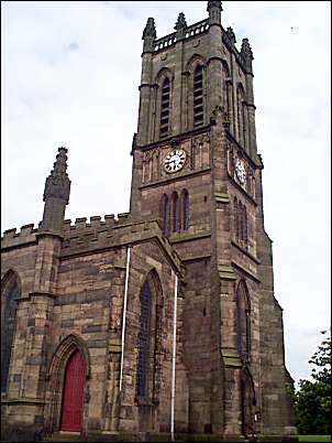 The 120 foot west tower is a landmark for miles around.