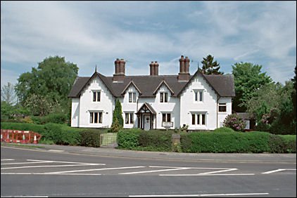 The cottages so bright and trim on the way