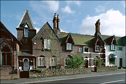 Row of cottages financed by Colin Minton Campbell