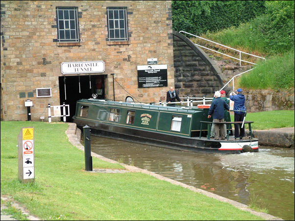 narrow boat entering the Telford tunnel portal