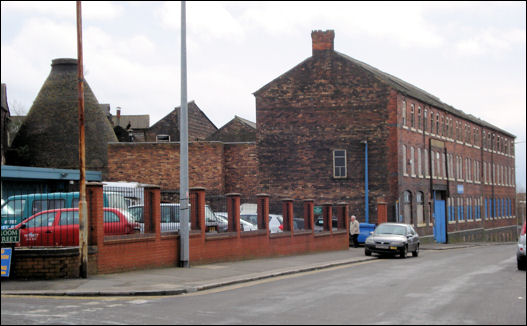 looking down Old Town Road with a view of the frontage and bottle kiln