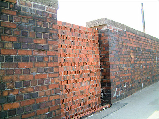 bricked up entrance to the platform steps