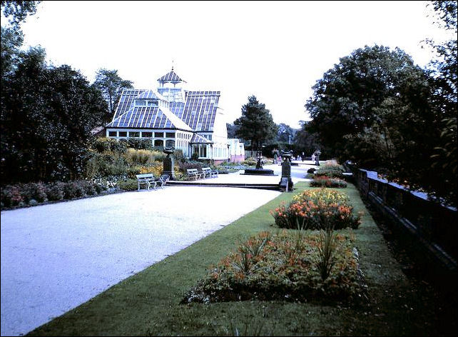 Photos of inside and outside of the conservatory in the Flower Park