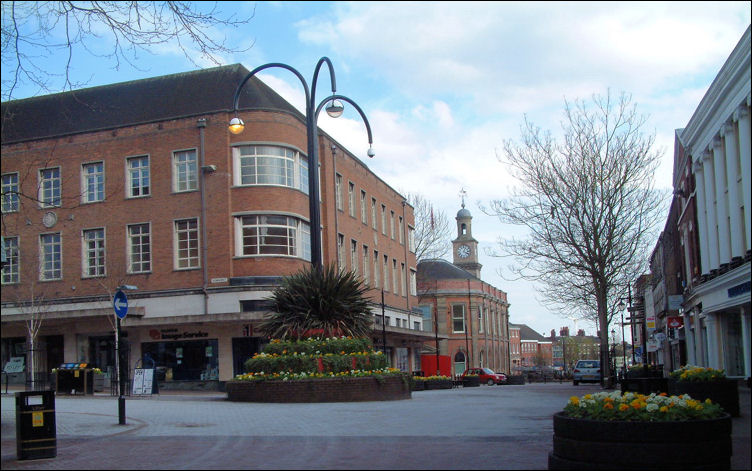 The main building is the Lancaster Buildings, behind is the Guildhall 