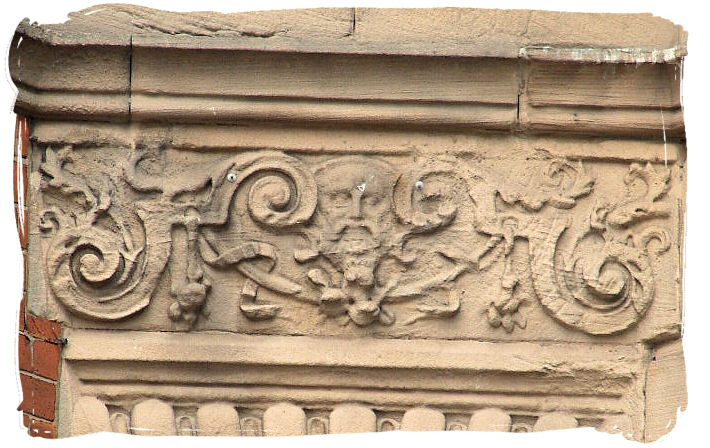 Green Man carved in sandstone at the entrance of Tunstall Market