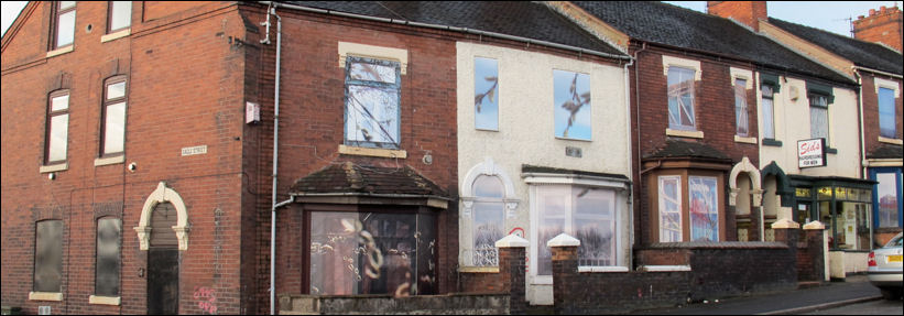 the whole row of terrace houses being prepared for demolition 