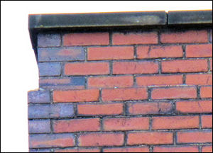 set back header bricks with cope stones