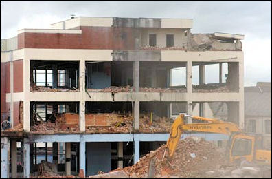 Demolition crews work on the Doulton main factory building